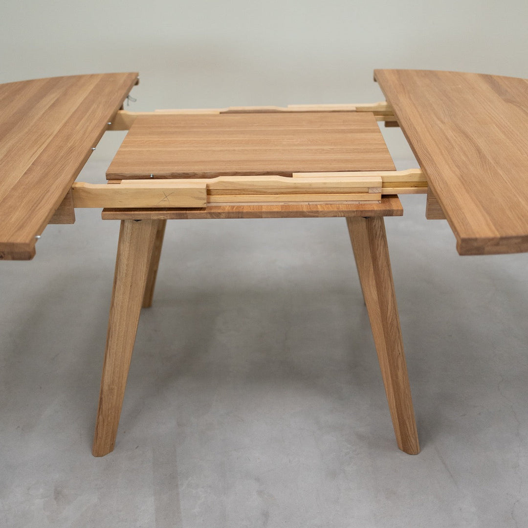 Mesa de comedor redonda y extensible de madera maciza de roble LEA | NordicStory